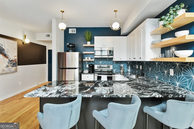 Building Photo - 208 12th St NE Unit 304