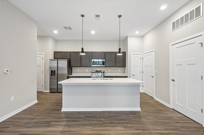 Kitchen of an available floor plan at Flats of Sugar Run luxury apartments in Delaware, OH.