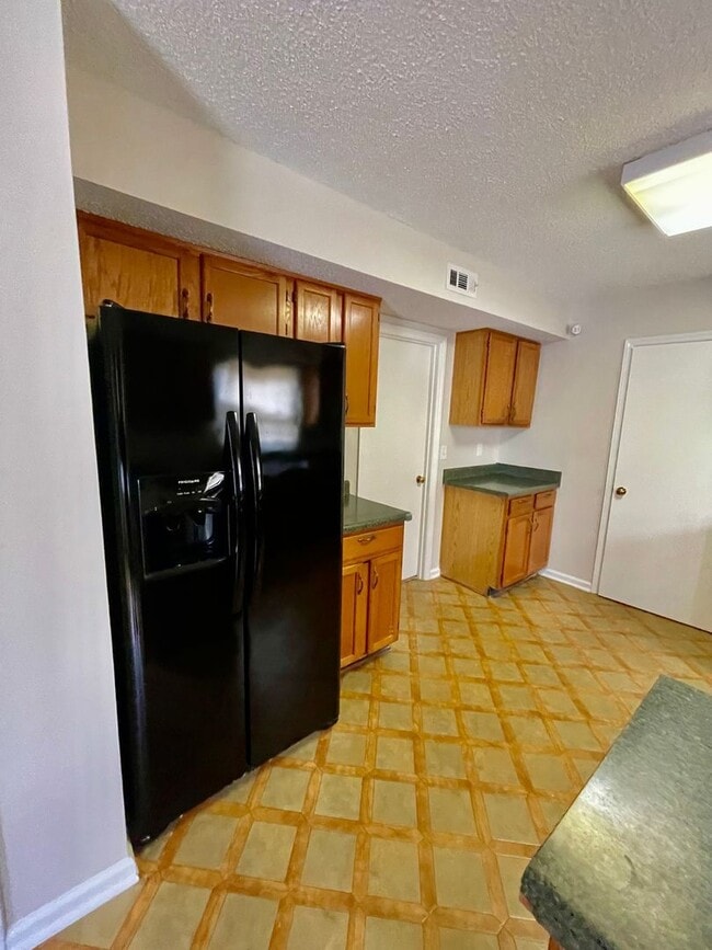 Photo - Beautiful 4 Bedroom Home with Fireplace & 2-Car Garage – Charlotte, NC