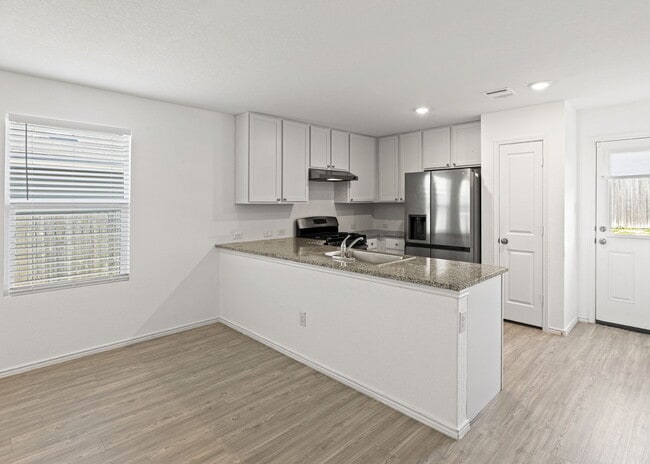 Photo - "Gorgeous 3-Bedroom Home with 2 Full Baths in San Antonio's Serene 1450 Sq Ft Retreat!"