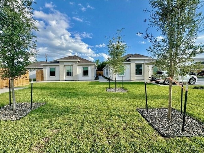 Building Photo - 7702 N 58th Ln Unit 4