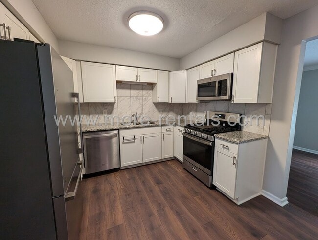 Photo - Remodeled house with garage