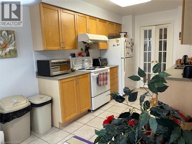 Photo - 25 Kingsbridge Garden Cir Unité 317