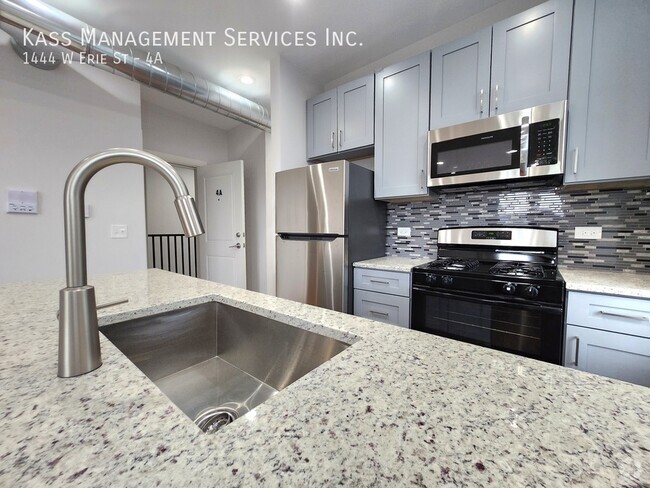 Building Photo - 1444 W Erie St Unit 4A Rental