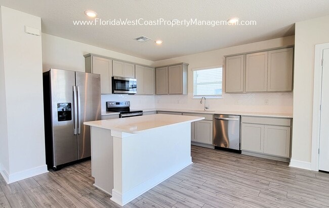 Photo - OUTSTANDING LARGE 4 BEDROOM/ 3 BATH HOME IN ISLES AT BAYVIEW! LARGE FLEX SPACE PLUS LAKEIVEWS!