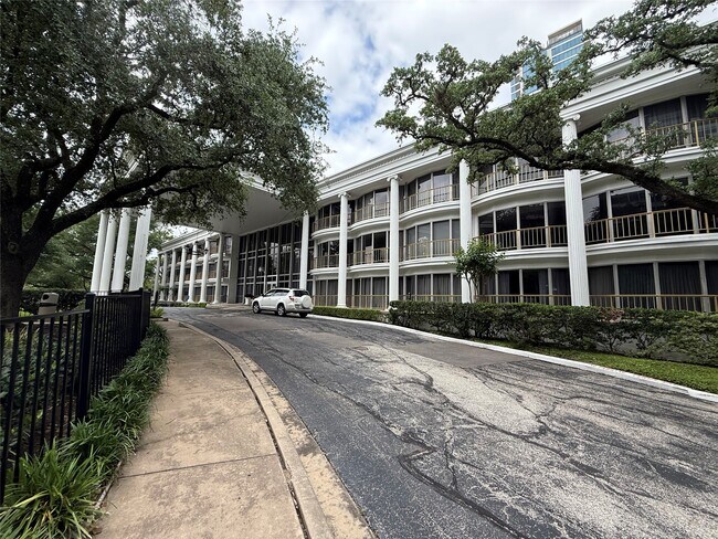 Building Photo - 5050 Ambassador Way Unit 212