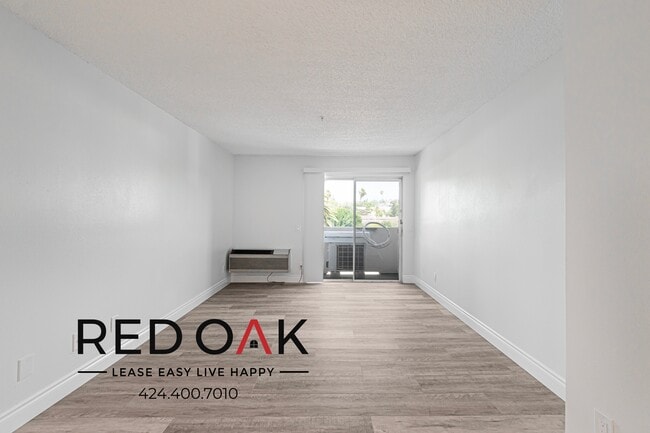 Building Photo - 5200 Oakland St Unit 201