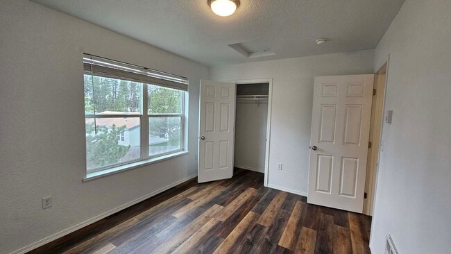 Photo - House with fenced yard and garage