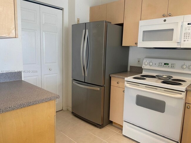 Building Photo - 7980 N Nob Hill Rd Unit 107