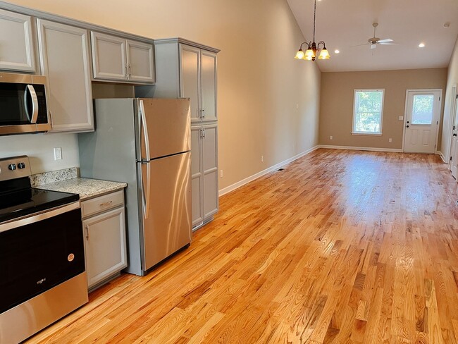 Photo - 3 Bed, 2 Bath New Construction Townhome with Granite & Hardwoods