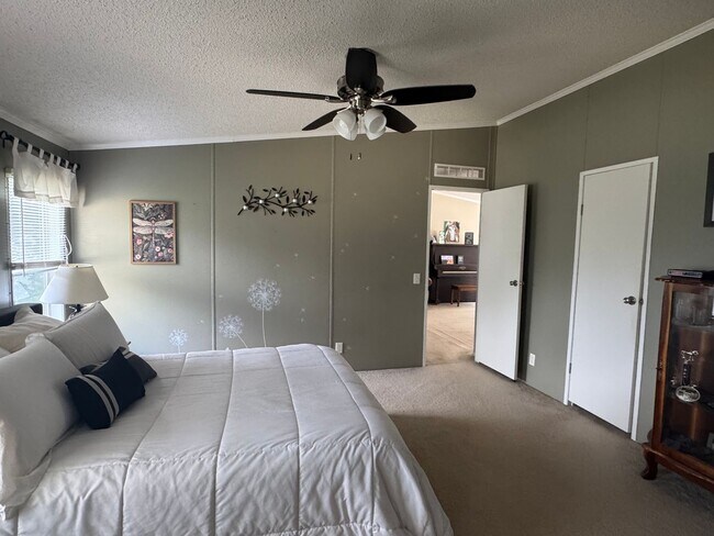 Photo - Spacious 3-Bedroom Home with Fenced Lot an...