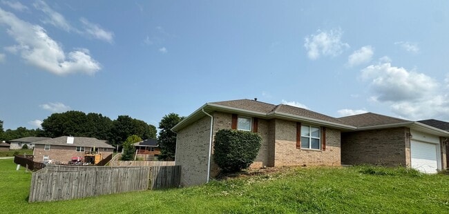 Building Photo - Beautiful Large corner lot 4 bedroom 3 full bathroom 2 car garage with 3 living rooms and much mo...