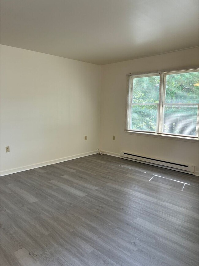 Photo - Bright & Spacious 2BR Top-Floor Apartment ...