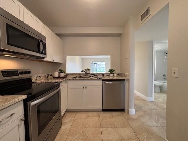 Building Photo - 6748 Palmetto Cir S Unit 104 Rental
