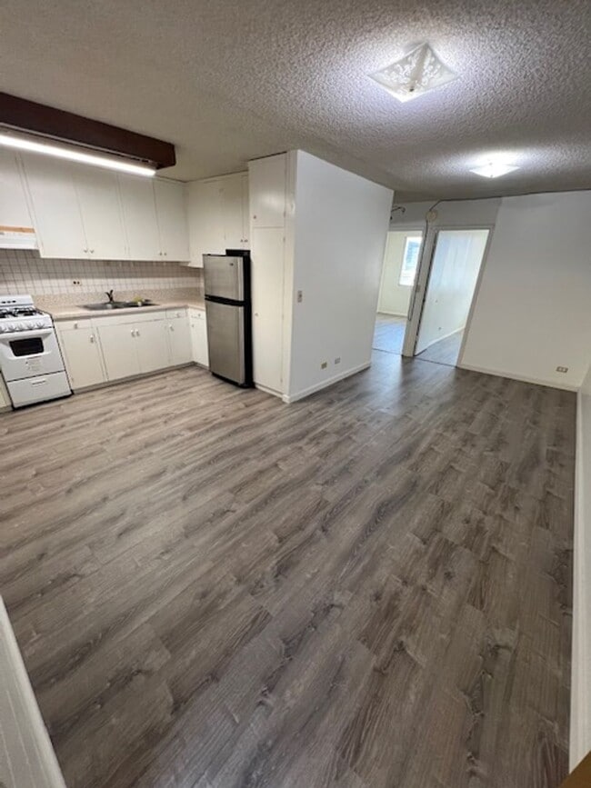Photo - Available now!  2 bedroom/ 1 bathroom/ 1 covered parking stall in Salt Lake Unit 303