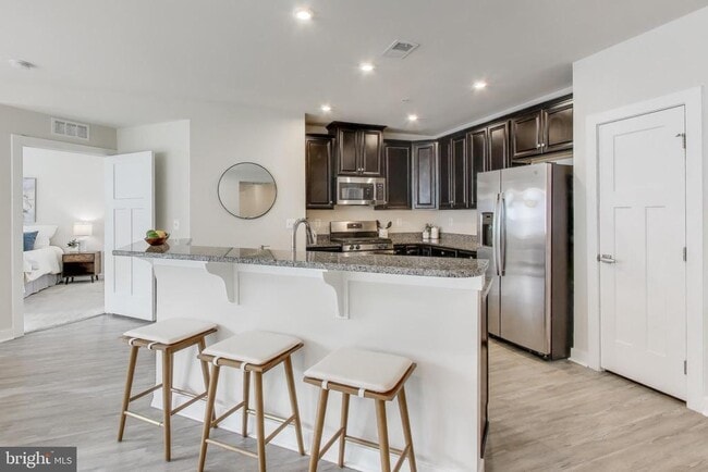 Building Photo - 10020 Ruffian Wy Unit E