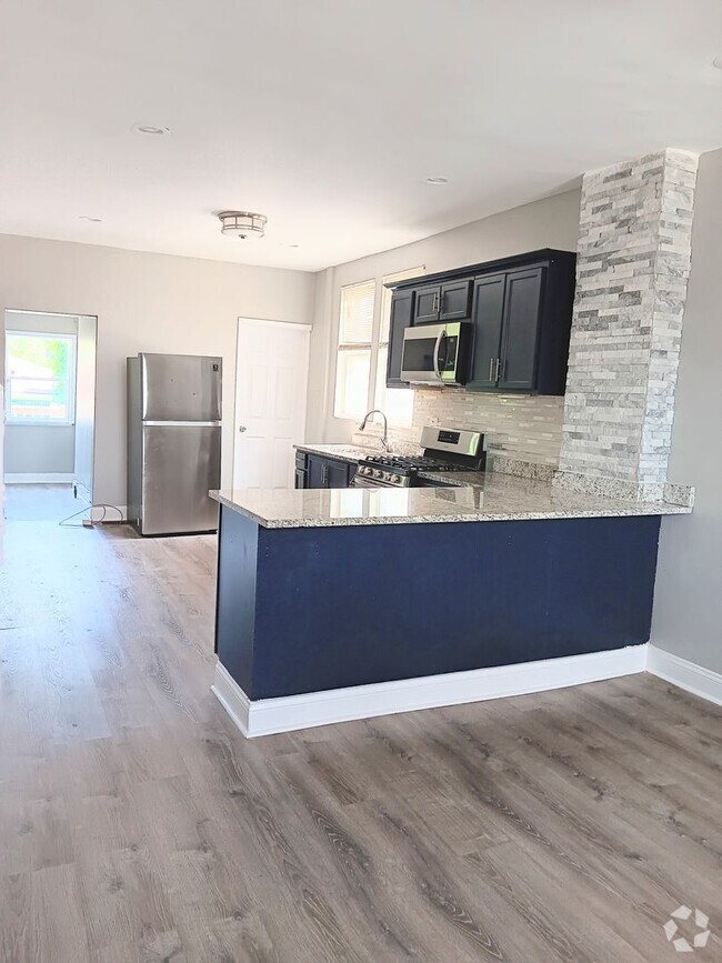 Building Photo - Modern Comfort Meets Unique Charm Rental