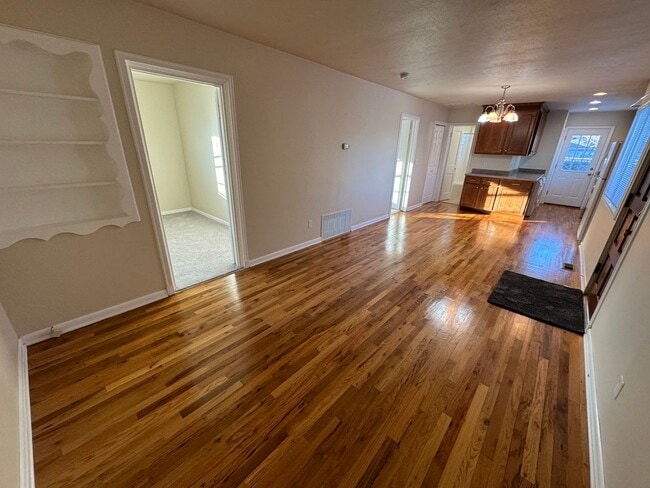 Photo - Cute little home with huge back yard.