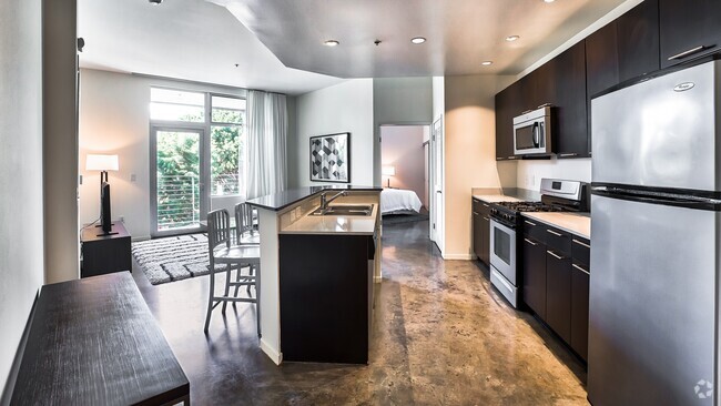 Polished concrete floors in select apartment homes - sunset + vine Rental