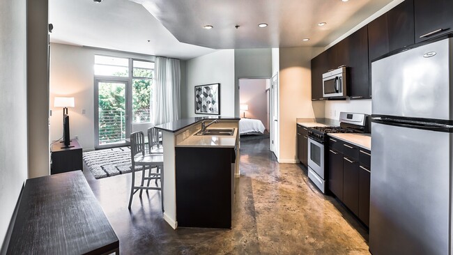 Polished concrete floors in select apartment homes - sunset + vine Apartments