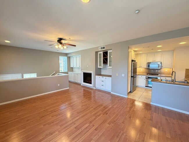 Photo - Sleek 2-Bed with a Den/Office + Flex Corner Condo with Attached Tandem Garage