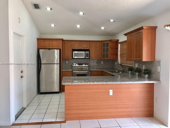 Photo - 5758 NW 97th Pl Condominio Unidad 0