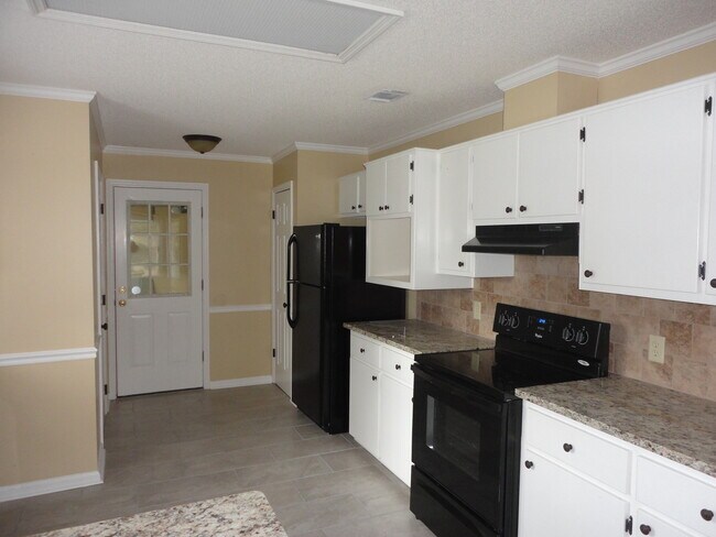 Photo - Discover Serenity: Elegant 3-Bedroom Home ...