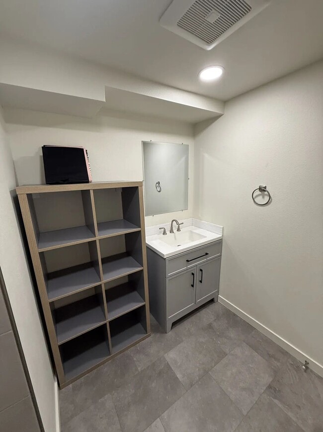 Photo - Newly Renovated Basement Unit with Private Fully Fenced Back Yard and Exclusive Parking Area