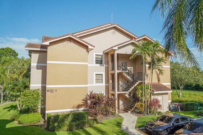 Building Photo - 9033 Wiles Rd Unit 304 Rental