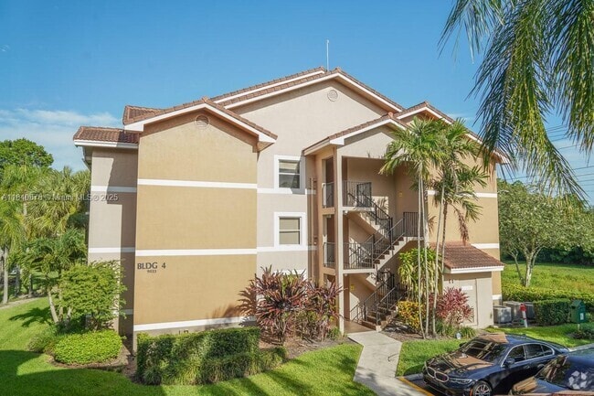 Building Photo - 9033 Wiles Rd Unit 304 Rental