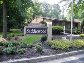 Entrance - Saddlewood Apartments & Townhomes