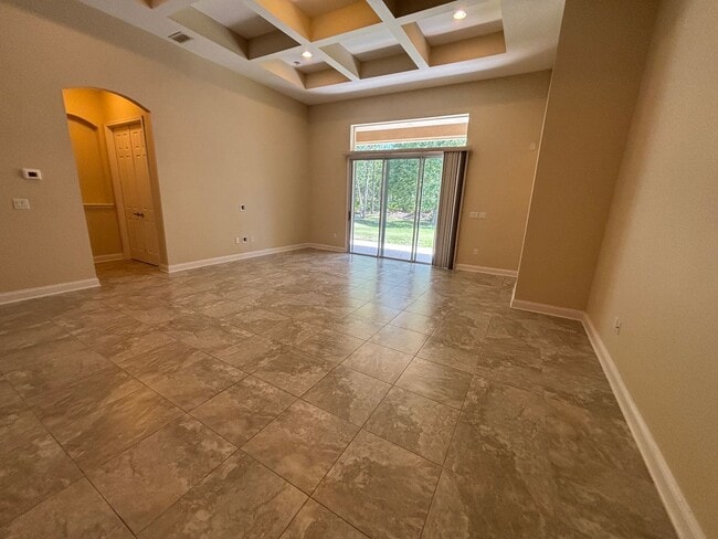 Photo - Spacious 4BR/3BA Home with 3-Car Garage, Bonus Office & Covered Patio in St Johns!