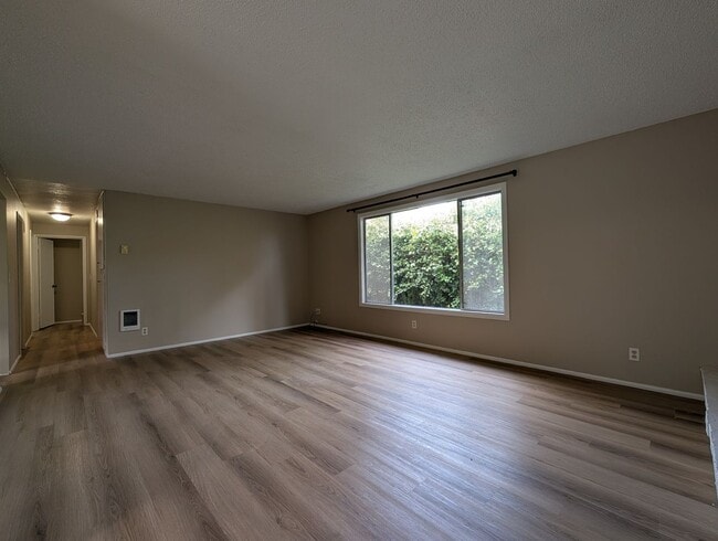 Photo - Bright 3 bedroom/ 1 bathroom Duplex with a fireplace and covered parking!