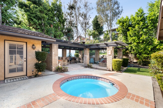 Back Yard, Heated inground Jacuzzi and a back patio - 1557 E Puente St