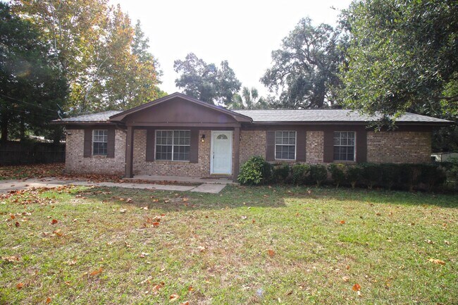 Photo - Spacious 3BR/1.5BA Home in Pace with Open Living Area, Tiled Family Room, and Fenced Backyard – M...