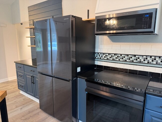 Photo - Lovely Single Level Rambler with Custom Finishes and Pet Friendly!