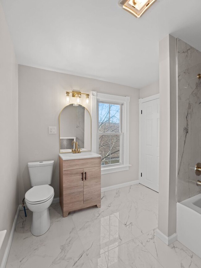 Photo - Spacious 5-Bedroom Rental with Backyard & Basement in Millville