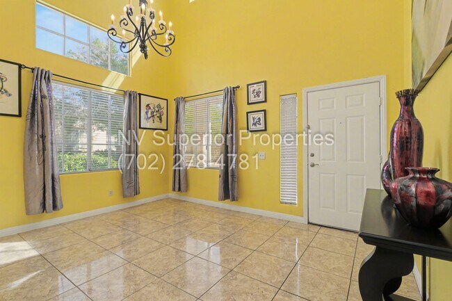 Photo - NW!! 4 Bedrooms!!! All Tile and Pergo flooring T/O!! NO Carpet!!! Low Maintenance Desert landscap...