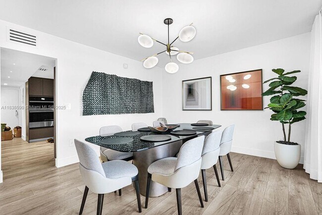 Building Photo - 9111 E Bay Harbor Dr Unit PHD Rental