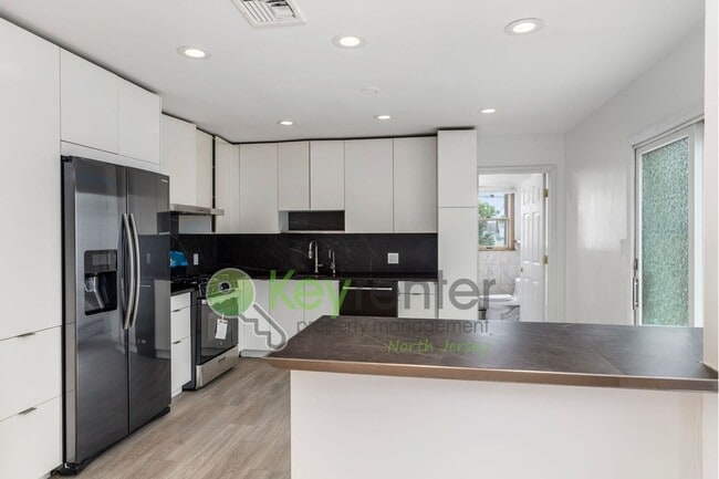 Photo - Spacious 4 Bedroom Home in Maywood with Fenced Yard, Office & Solar Panels