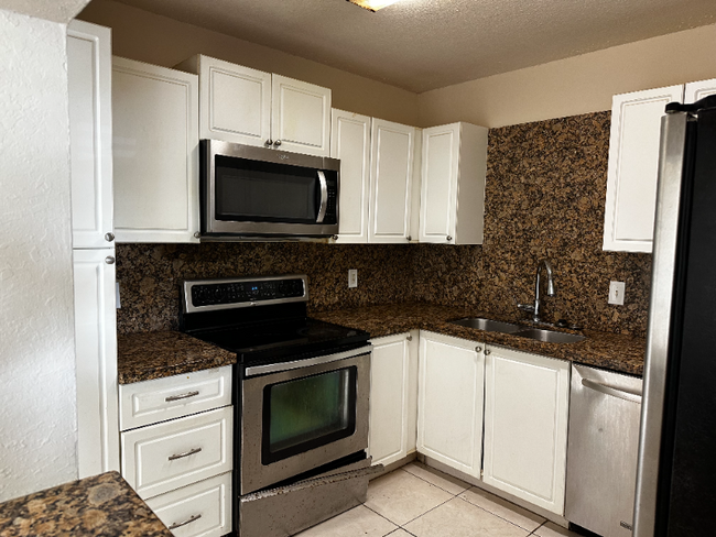 Photo - 10857 NW 45th St Townhome