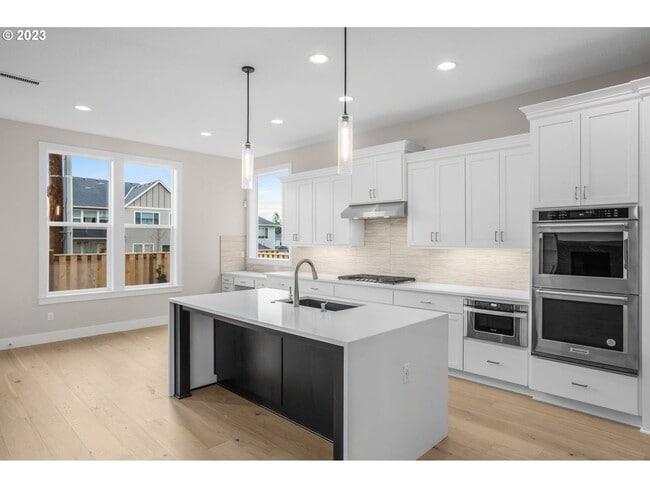 Photo - Beautiful 4 Bedroom + Office Home with Open Layout, Gourmet Kitchen & Large Entertainment Room