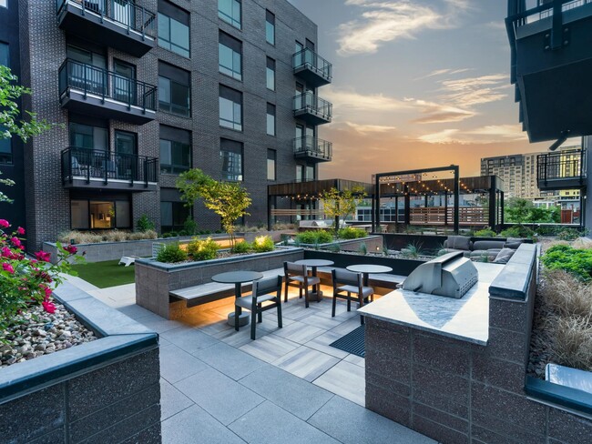 Our outdoor courtyard at Modera Golden Triangle is your personal oasis for al fresco dining and relaxed evenings.