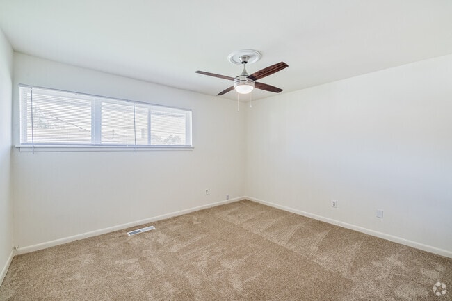 2BR, 1BA - 950SF - Primary Bedroom - Village at the Arbors