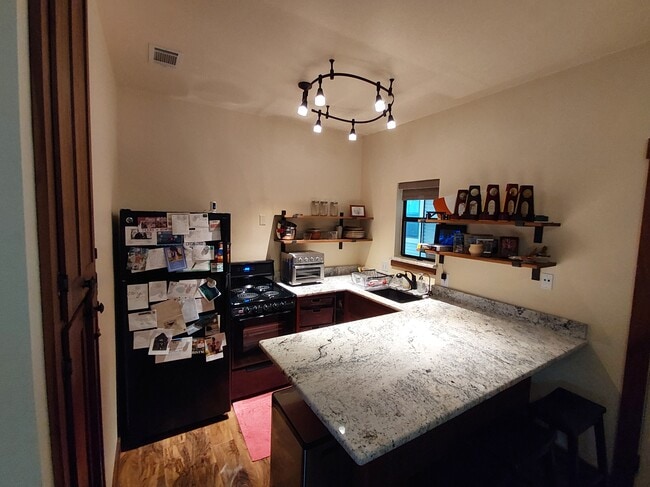Building Photo - 4401 Speedway Unit 304