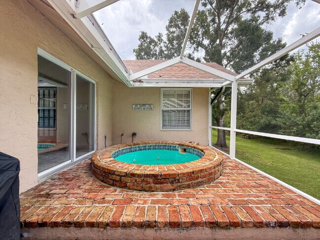 "Spacious 4-Bedroom Oasis in Tarpon Springs – 3,259 Sq Ft of Comfort and Style!"