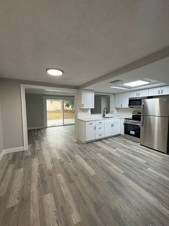 Photo - Fully Remodeled 3bed/2bath Home with Bonus Room & Modern Upgrades