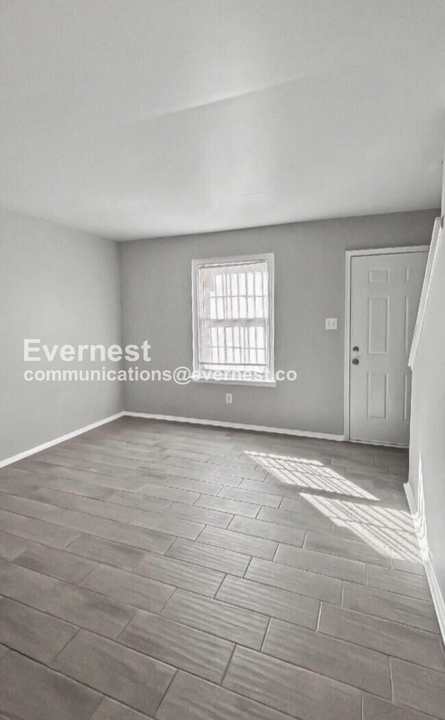 Photo - Townhome with Modern Amenities and Off-Street Parking