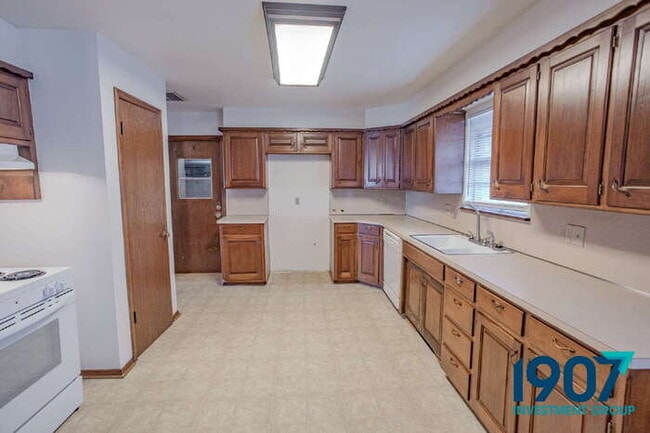 Photo - Spacious 2-Bedroom Home with Hardwood Flooring and Brick Fireplace in OKC!