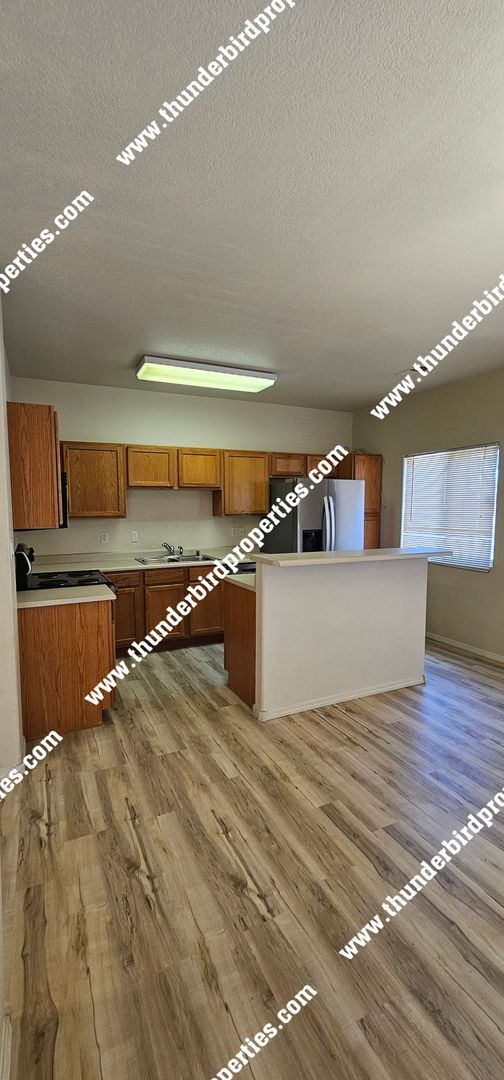Photo - Gated Community 2 Bedroom, 2.5 Bathroom, 2 Car Garage, Upstairs Loft & Backyard. Available NOW!
